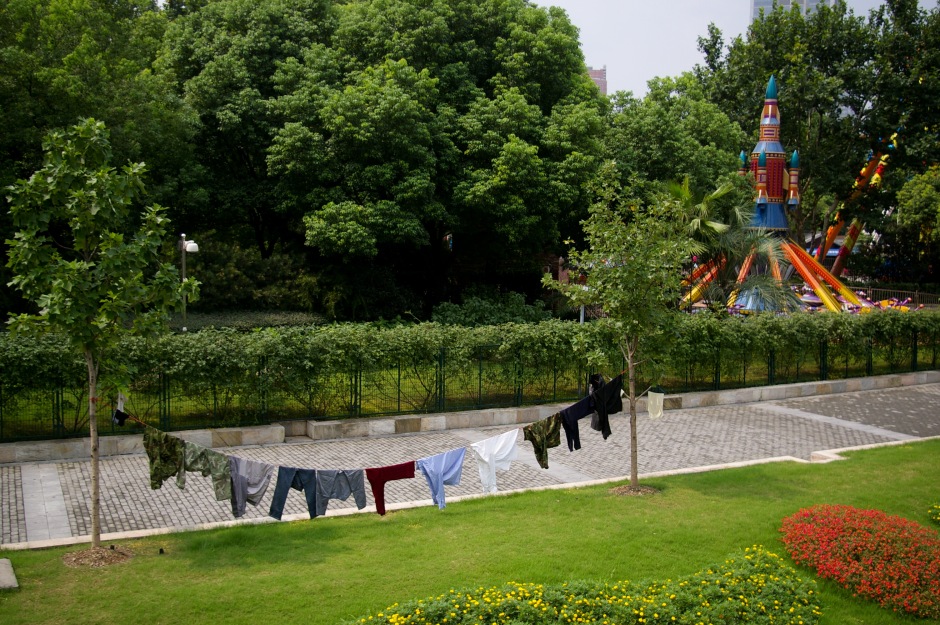 A line of laundry dries outside of a children's theme park in Shanghai